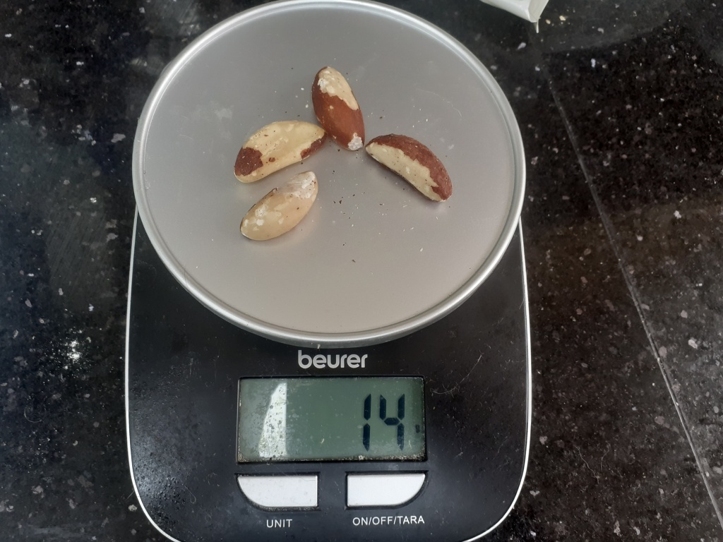 Brazil nuts on a set of scales